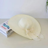 Jurerê Hat – Elegant Beach Style with a Wide Brim and Bow Detail